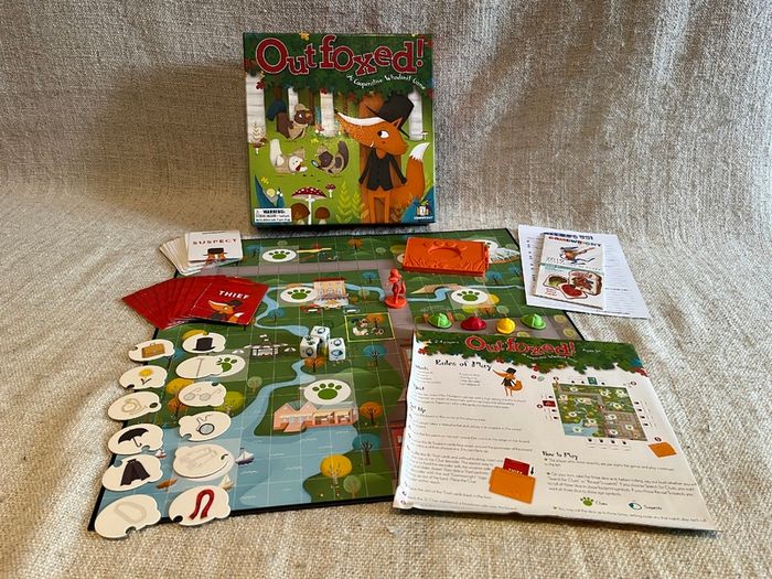 4 board games for kids: Poo Bingo, Junior Rummikub & cooperative games Outfoxed, Race to the Treasure