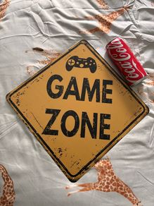NEW game zone sign