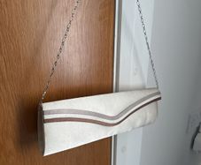 Satin clutch with detachable strap chain