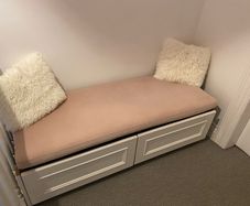 handmade storage bench/window seat with two large built-in drawers and a comfortable upholstered cushion