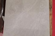 Durstone.  5.76m2 60x60 tiles light grey