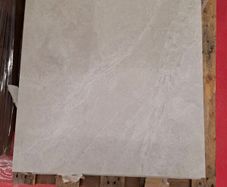 Durstone.  5.76m2 60x60 tiles light grey