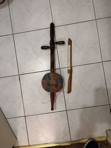 2 stringed North African like fiddle violin