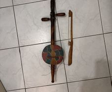 2 stringed North African like fiddle violin