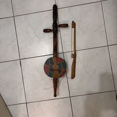 2 stringed North African like fiddle violin