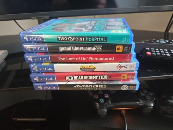 PS4 Pro Console + 2 Controllers & 7 Games