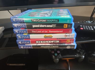 PS4 Pro Console + 2 Controllers & 7 Games