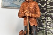 Beautiful man and dog wooden carved figure