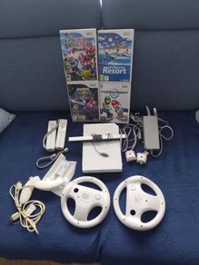 Wii with Mario kart, Sports resort, Mario Galaxy, Smash Brawl and HDMI