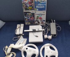 Wii with Mario kart, Sports resort, Mario Galaxy, Smash Brawl and HDMI