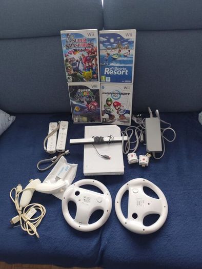Wii with Mario kart, Sports resort, Mario Galaxy, Smash Brawl and HDMI