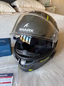 shark motorcycle helmet with Sena Bluetooth kit installed