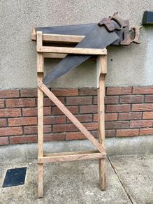 Vintage Pine wooden carpenter's saw Horse, To include two vintage . W. Tyzack, Son & Turner saws. Good Wexford provenance.
