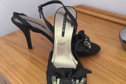Black sling backs