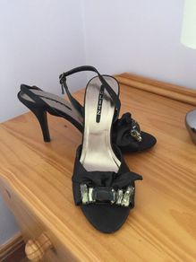 Black sling backs