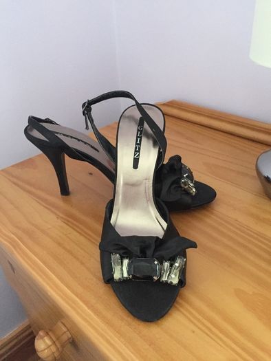 Black sling backs