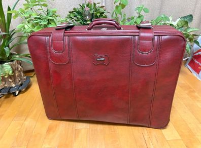 Vintage burgundy faux-leather suitcase