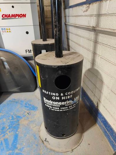 Commercial-grade patio heater suitable for outdoor commercial or residential use. Operates on propane or natural gas. Portable design with stable base. High heat output