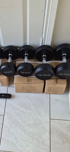 4 brand new sets of dumbbells