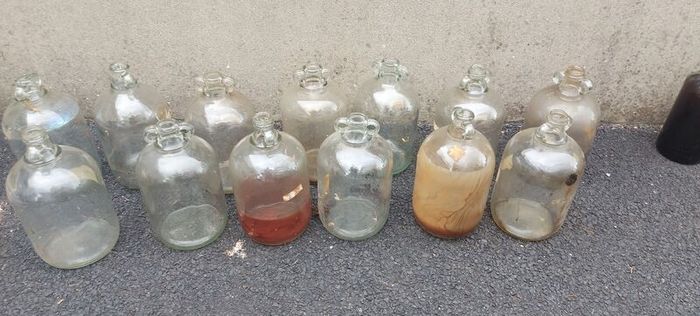 13 x demi johns,glass jars ,used condition, needs a clean,,buyer collects,,10 euros each or a deal  for the 13 ,sold as is