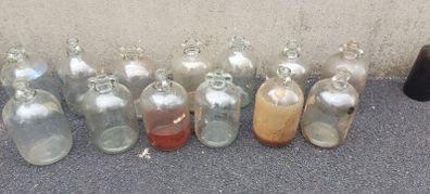 13 x demi johns,glass jars ,used condition, needs a clean,,buyer collects,,10 euros each or a deal  for the 13 ,sold as is