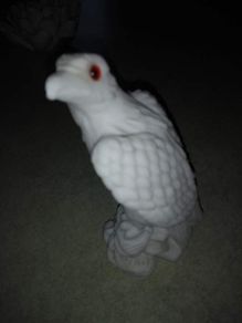 old eagle figurine .