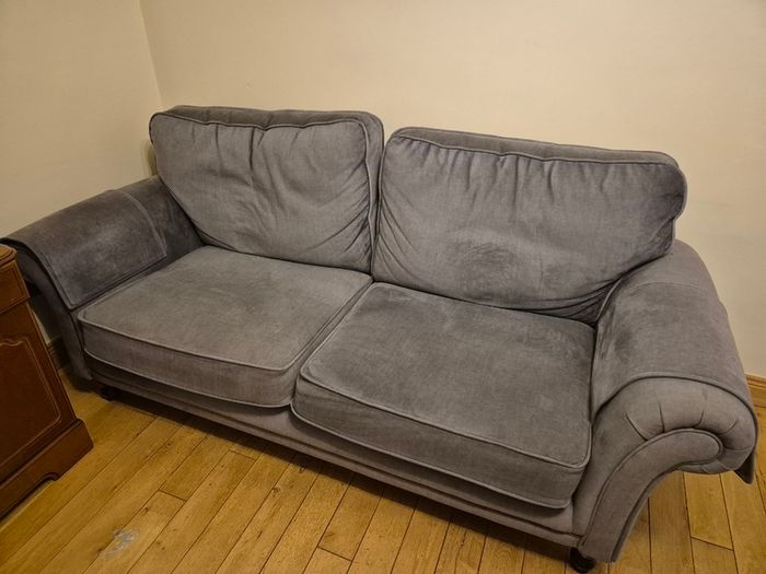 Two grey fabric sofas