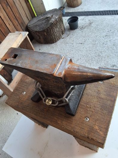 anvil on timber stand
