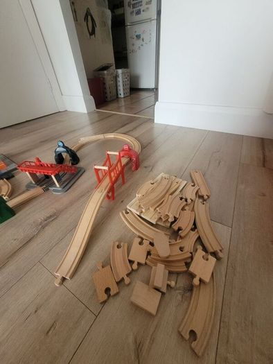 wooden train play set with two electric locomotives and lots of parts