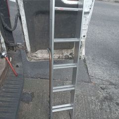 Two piece extendable ladder