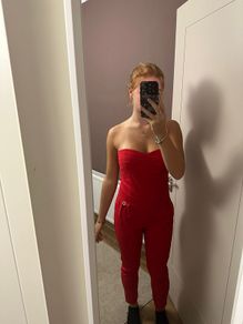 red jumpsuit