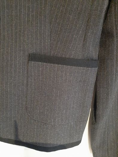 New jacket pin stripe tag attached