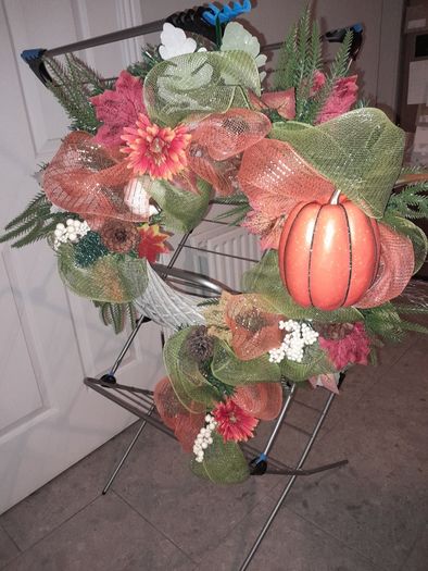 Door Wreath ( Giant- sized) and floral arrangement.