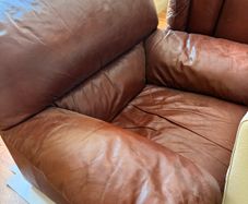 Brown leather arm chair