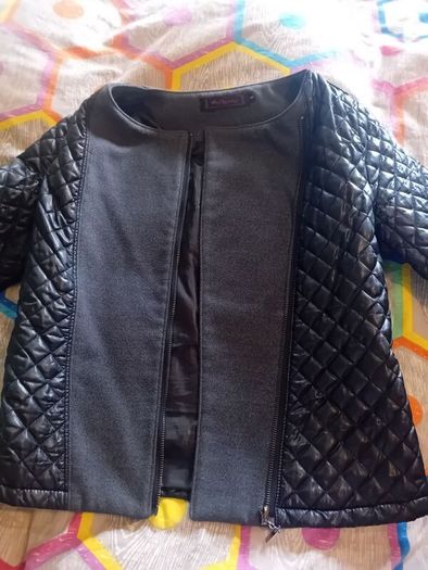 ladies jacket. Padded design. Black with grey material. Size small
