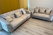 set of sofas with storage and cushions included