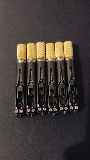 Headless guitar fixed bridge