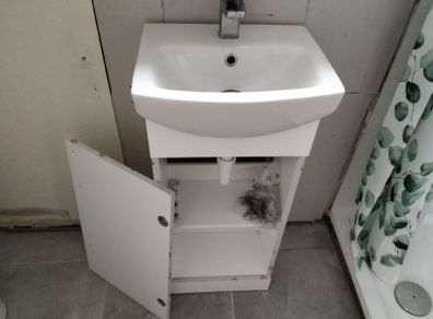 Washhand basin,tap  and vanity unit
