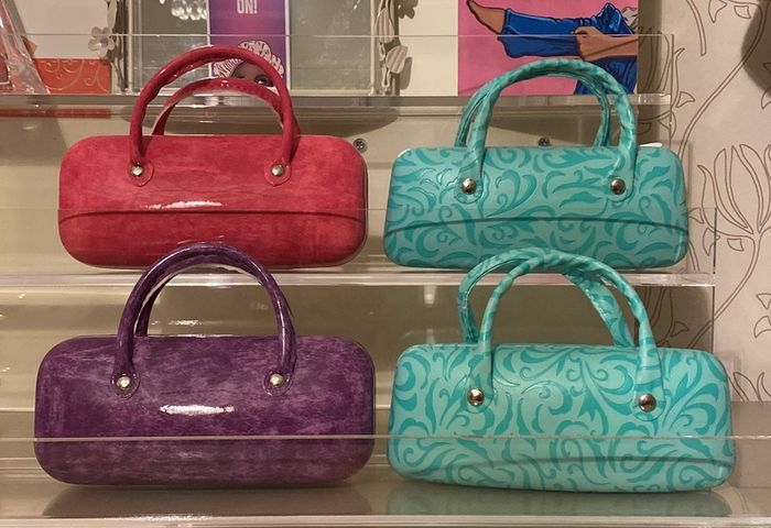 Glasses cases  2 blue 1 purple 2 pink  1 animal print .