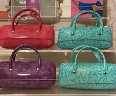 Glasses cases  2 blue 1 purple 2 pink  1 animal print .