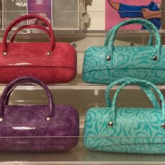 Glasses cases  2 blue 1 purple 2 pink  1 animal print .