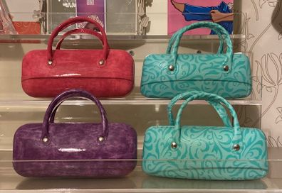 Glasses cases  2 blue 1 purple 2 pink  1 animal print .