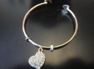 main image for ad Torc Charm Bangle