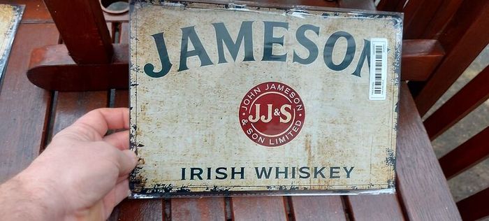 Jameson irish advertising whiskey metal repo sign  ,,buyer collects or pays postage thank you, lovely advertising display item, nice for home bar or man cave pub restaurant etc, or present, sold as seen .