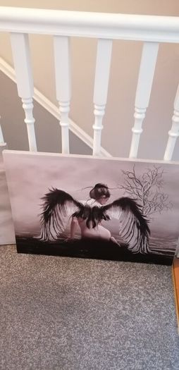 Beautiful angel canvases. Diammante edge around canvas  lovely on a wall