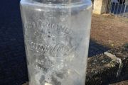 Large glass jar with tap.