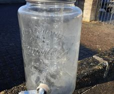 Large glass jar with tap.