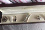 4 silver pendents