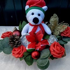 Christmas basket with teddy bear and artificial flowers