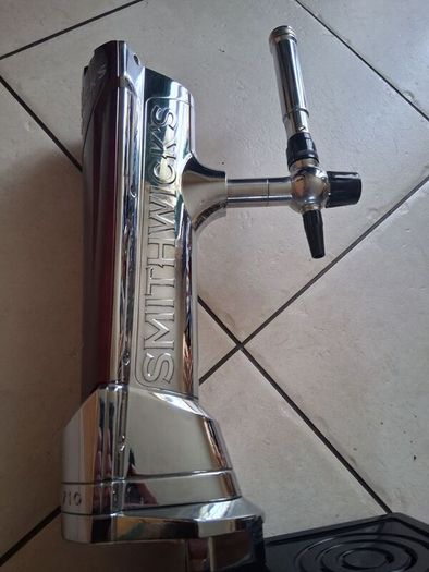 Large Smithwicks beer tap tower